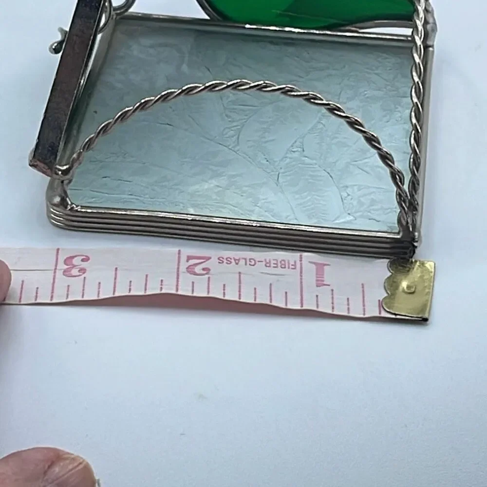 Stained glass leaded framed tea light holder.